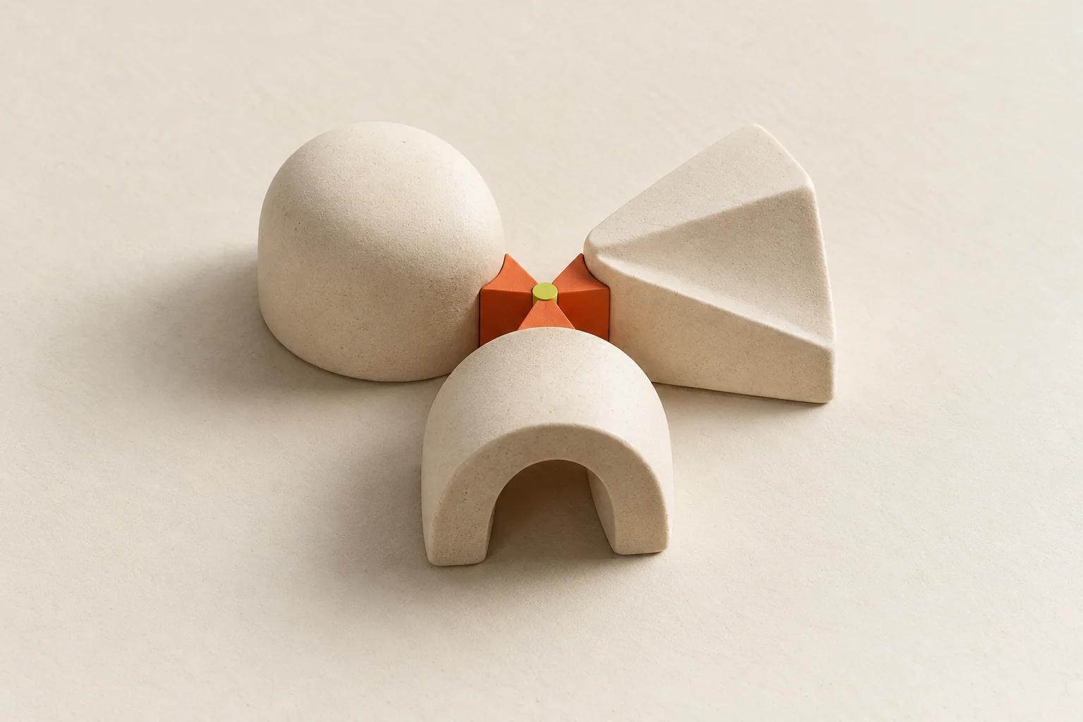 Three equal sculptural forms meeting at one shared connection, a concept for working together.